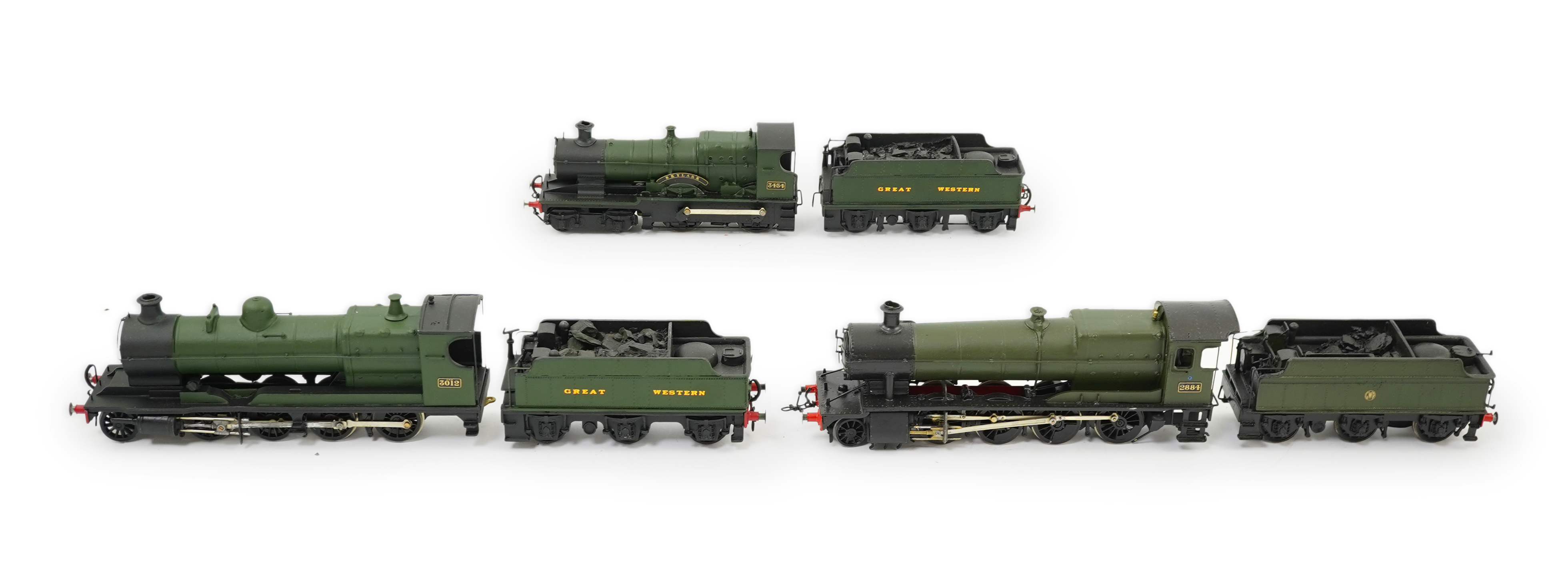 Three 00 gauge brass and white metal kit built GWR tender locomotives; a 2884 class 2-8-0, 2884, together with an 33xx class 4-4-0, 3454, and a War Dept. 2-8-0, 3012, all constructed, painted and lined to a high standard